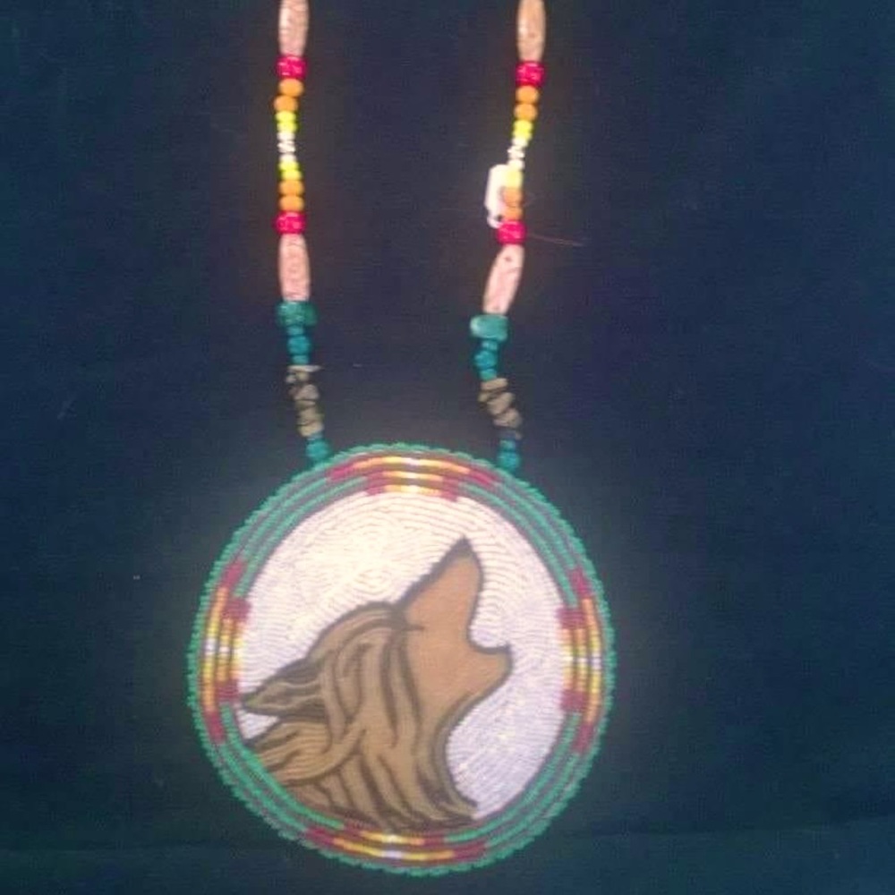 Handmade beadwork NHL, or NBA wolf medallion???
